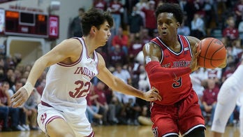 St. John's coach Rick Pitino throws out first pitch to Donovan Mitchell at  Subway Series