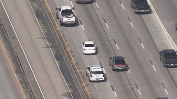 Houston-area suspect who opened fire on precinct killed after high-speed chase, authorities say