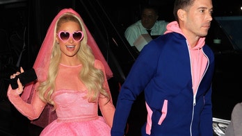 Paris Hilton stuns in hot pink wedding dress for carnival-themed after-party: photos