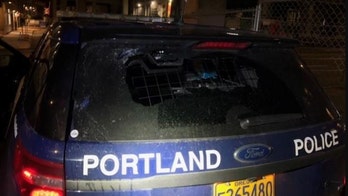 Portland Rittenhouse protest declared riot; windows smashed, objects thrown at police