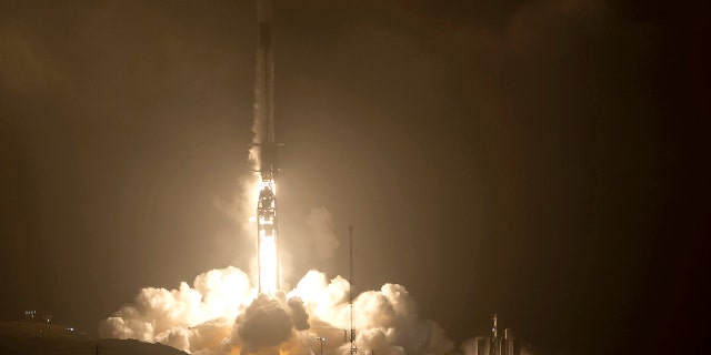 The SpaceX Falcon 9 rocket launches with the Double Asteroid Redirection Test, or DART, spacecraft onboard, Tuesday, Nov. 23, 2021, from Space Launch Complex 4E, at Vandenberg Space Force Base in California.