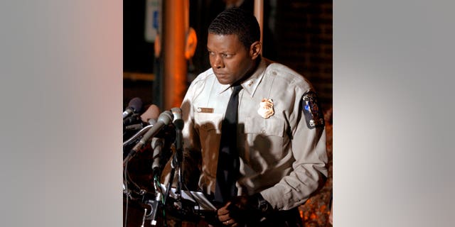 Montgomery County Police Chief Charles Moose prepares to deliver a message to the Washington, D.C., area sniper at a news briefing in Montgomery County, Maryland, Oct. 23, 2002. Moose also announced that law enforcement officials are seeking John Allen Williams for questioning in relation to the sniper investigation. REUTERS/Brian Snyder