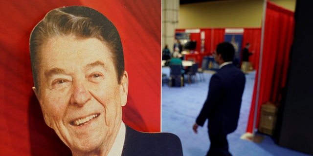 The image of President Ronald Reagan is on display at an exhibit stand at the Conservative Political Action Conference (CPAC) in Oxon Hill, Maryland, U.S., February 28, 2019. REUTERS/Kevin Lamarque