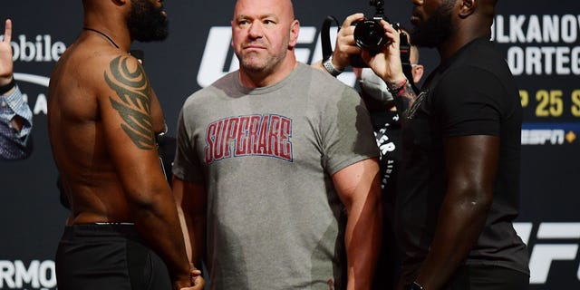 Sep 24, 2021; Las Vegas, Nevada, USA; Curtis Blaydes and Jairzinho Rozenstruik meet face to face as UFC president Dana White separates them during weigh-ins for UFC 266 at Park Theater. Mandatory Credit: Gary A. Vasquez-USA TODAY Sports