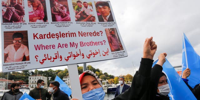 Ethnic Uighur demonstrators take part in a protest against China, in Istanbul, Turkey, October 1, 2021. 