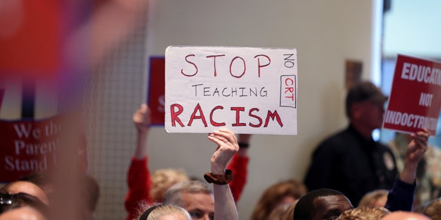 Opponents of an academic doctrine known as Critical Race Theory attend a packed Loudoun County School board meeting until the meeting erupted into chaos and two people were detained, in Ashburn, Virginia, U.S. June 22, 2021.