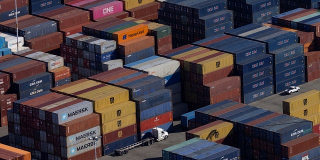 Shipping containers are seen at the container terminal of the port of Oakland, California, U.S., October 28, 2021. REUTERS/Carlos Barria