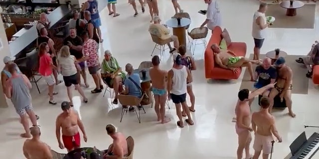 Guests gather in the hotel lobby after a reported shooting at Hyatt Ziva Riviera Cancun resort, in Cancun, Quintana Roo, Mexico, Nov. 4, 2021 in this still image obtained from a social media video. 