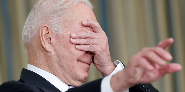 FILE – President Joe Biden gestures as he delivers remarks after late-night passage of a $1 trillion infrastructure bill to repair the nation's airports, roads and bridges, at the White House in Washington, D.C., on November 6, 2021.