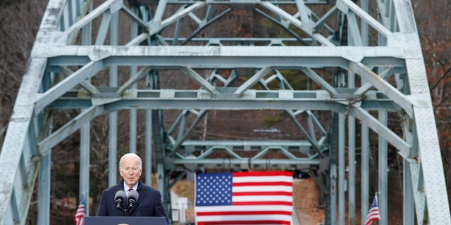 President Joe Biden delivers remarks on infrastructure construction projects from the NH 175 bridge across the Pemigewasset River in Woodstock, New Hampshire, U.S., November 16, 2021. REUTERS/Jonathan Ernst