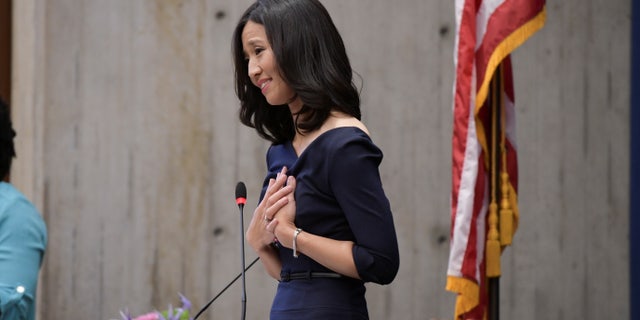 Michelle Wu after she is sworn in as mayor, becoming the first woman and first person of color elected to the office, in Boston, Massachusetts, Nov. 16, 2021. REUTERS/Faith Ninivaggi