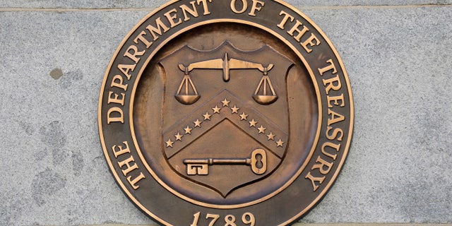 FILE PHOTO: Signage is seen at the United States Department of the Treasury headquarters in Washington, D.C., U.S., August 29, 2020.