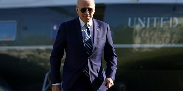 U.S. President Joe Biden, who was given a physical this morning at Walter Reed National Military Medical Center, walks from Marine One upon his return to the White House in Washington, U.S., November 19, 2021.
