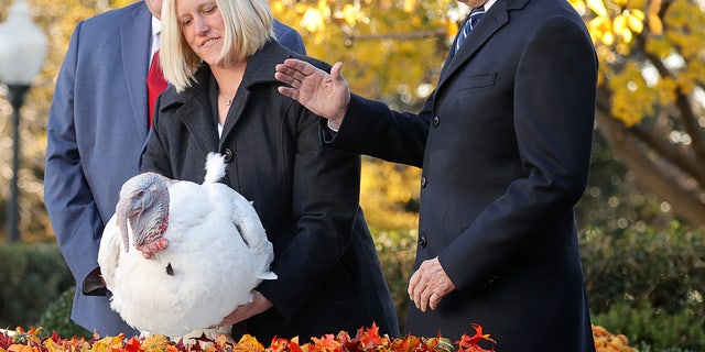 Biden pardons the national Thanksgiving turkey, Peanut Butter, in 2021. REUTERS/Jonathan Ernst