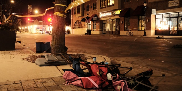 Chairs are left abandoned after a car plowed through a holiday parade in Waukesha, Wisconsin