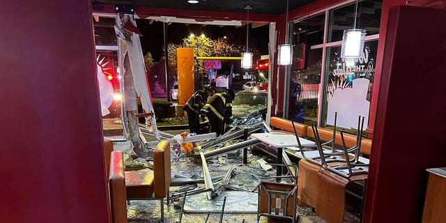 Inside the restaurant, the front of the car smashed through a seating area and seemingly sent tables and chairs flying.