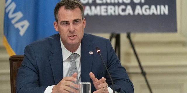 Kevin Stitt, governor of Oklahoma, speaks during a meeting with U.S. President Donald Trump and governors in the State Dining Room of the White House on Thursday, June 18, 2020. The Pardon and Parole Board has recommended that the governor give Julius Jones clemency.