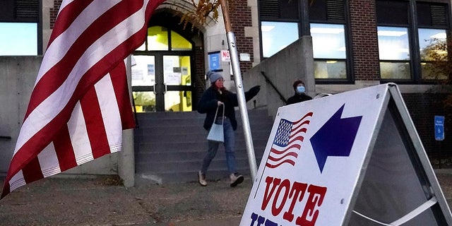 Voters emerge from Sabathani Community Center after casting their ballots during municipal elections Tuesday, Nov. 2, 2021, in Minneapolis.