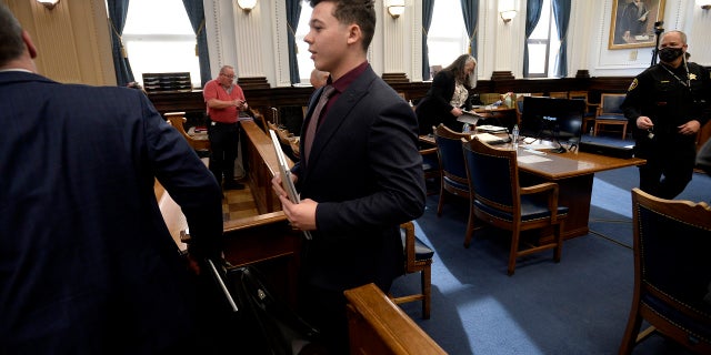 Kyle Rittenhouse leaves the courtroom after his side gives opening statements to the jury at the Kenosha County Courthouse in Kenosha, Wis, on Monday, Nov. 2, 2021. Rittenhouse is accused of killing two people and wounding a third during a protest over police brutality in Kenosha, last year. (Sean Krajacic/The Kenosha News via AP, Pool)