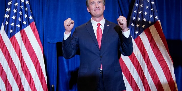 Virginia Gov.-elect Glenn Youngkin arrives to speak at an election night party in Chantilly, Virginia, early Wednesday, Nov. 3, 2021, after he defeated Democrat Terry McAuliffe. (AP Photo/Andrew Harnik)