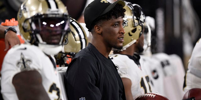 New Orleans Saints wide receiver Michael Thomas sits on the bench during the Ravens game on Aug. 14, 2021, in Baltimore.