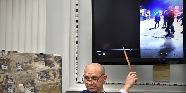 Corey Chirafisi, an attorney for Kyle Rittenhouse, points to a video while questioning Koerri Washington during the trial at the Kenosha County Courthouse in Kenosha, Wis., on Wednesday, Nov. 3,  2021.  (Sean Krajacic/The Kenosha News via AP, Pool)