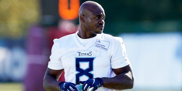 Tennessee Titans running back Adrian Peterson warms up during an NFL football practice Friday, Nov. 5, 2021, in Nashville, Tenn. The Titans signed 2012 NFL MVP and four-time All-Pro running back Peterson to help replace injured NFL rushing leader Derrick Henry.