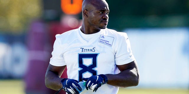 Tennessee Titans running back Adrian Peterson warms up during an NFL football practice Friday, Nov. 5, 2021, in Nashville, Tenn. The Titans signed 2012 NFL MVP and four-time All-Pro running back Peterson to help replace injured NFL rushing leader Derrick Henry.