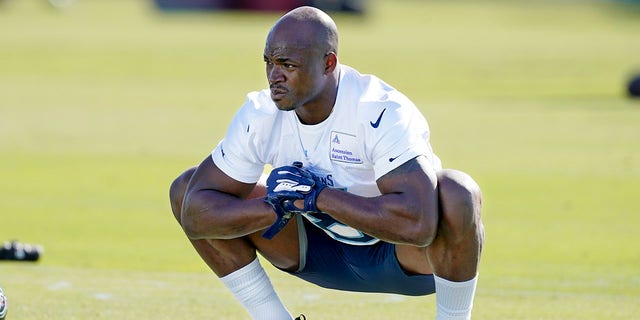 Tennessee Titans running back Adrian Peterson warms up during an NFL football practice Friday, Nov. 5, 2021, in Nashville, Tenn. The Titans signed 2012 NFL MVP and four-time All-Pro running back Peterson to help replace injured NFL rushing leader Derrick Henry.