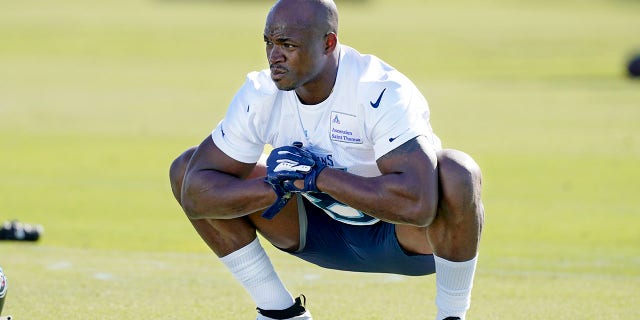 Tennessee Titans running back Adrian Peterson warms up during an NFL football practice Friday, Nov. 5, 2021, in Nashville, Tenn. The Titans signed 2012 NFL MVP and four-time All-Pro running back Peterson to help replace injured NFL rushing leader Derrick Henry.