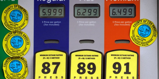 High gas prices are posted at a full service gas station in Beverly Hills, Calif., Sunday, Nov. 7, 2021. The average U.S. price of regular-grade gasoline jumped by 5 cents over the past two weeks, to $3.49 per gallon. The price at the pump is $1.30 higher than a year ago. Industry analyst Trilby Lundberg of the Lundberg Survey said Sunday the rise comes as the cost of crude oil and ethanol surges. Nationwide, the highest average price for regular-grade gas is in the San Francisco Bay Area, at $4.77 per gallon. The lowest average is in Houston, at $2.98 per gallon. (AP Photo/Damian Dovarganes)