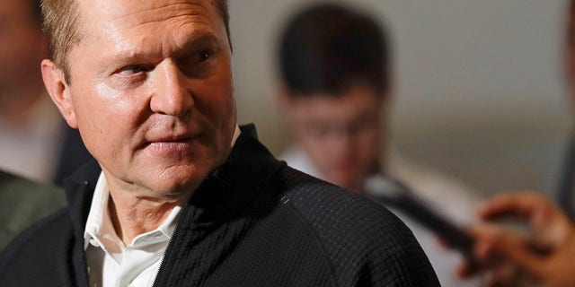 Sports agent Scott Boras, wearing a jacket with his personal logo, speaks at the Major League Baseball winter meetings in San Diego on Dec. 10, 2019.