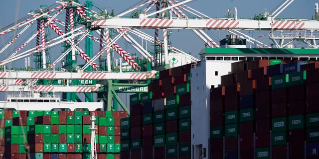 Shipping containers are stacked at the Port of Los Angeles Wednesday, Nov. 10, 2021, in Los Angeles.
