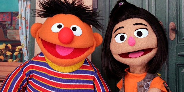 Ernie, a muppet from the popular children's series "Sesame Street," appears with new character Ji-Young, the first Asian American muppet, on the set of the long-running children's program in New York on Nov. 1, 2021.