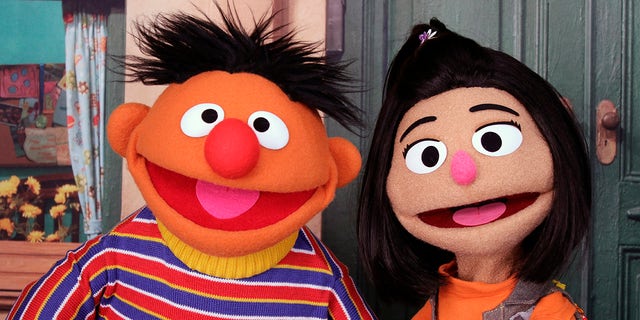 Ernie, a muppet from the popular children's series "Sesame Street," appears with new character Ji-Young, the first Asian American muppet, on the set of the long-running children's program in New York on Nov. 1, 2021. (AP Photo/Noreen Nasir)