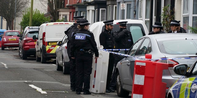 Police activity in Sutcliffe Street in the Kensington area of the city, after an explosion at the Liverpool Women's Hospital killed one person and injured another on Sunday, in Liverpool, England. (Peter Byrne/PA via AP)