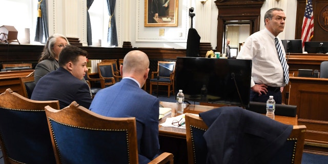 MARK RICHARDS in white shirt, defense attorney for Kyle Rittenhouse, paces the courtroom before the start of the days proceedings in the Kyle Rittenhouse trial in Kenosha (Wisconsin) Circuit Court Monday November 15, 2021. (Mark Hertzberg /Pool Photo via AP)