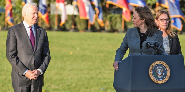 President Biden looks at Vice President Kamala Harris during a ceremony where he will signs into law his Bipartisan Infrastructure Deal, H.R. 3684, the Infrastructure Investment and Jobs Act on the South Lawn of the White House on Nov. 15, 2021, in Washington, D.C.