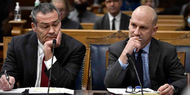 Kyle Rittenhouse attorneys Mark Richards (left) and Corey Chirafisi listen as Judge Bruce Schroeder speaks during the trial at the Kenosha County Courthouse in Kenosha, Wisconsin on Tuesday, November 16, 2021.  Rittenhouse is accused of killing two people and injuring a third in a protest against police brutality in Kenosha last year.   