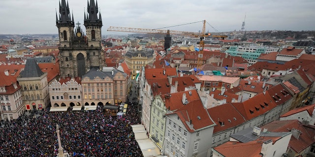 Demonstrators gather to protest against the government restriction measures to curb the spread of COVID-19 in Prague, Czech Republic, Wednesday, Nov. 17, 2021.Â