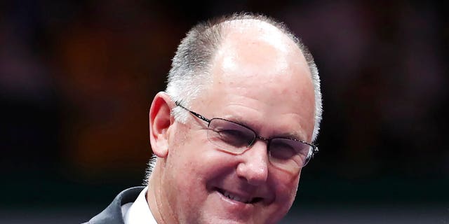 FILE - WTA Chief Executive Officer Steve Simon smiles during a retirement ceremony for Martina Hingis in Singapore on Oct. 29, 2017.  An email purportedly from a Chinese professional tennis player that a Chinese state media outlet posted on Twitter has increased concerns about her safety as the sport's biggest stars and others abroad call for information about her well-being and whereabouts. Simon, the chairman and CEO of the Women's Tennis Association, questioned the authenticity of the email intended for him, in which Grand Slam doubles champion Peng Shuai says she is safe and that the assault allegation is untrue. (AP Photo/Yong Teck Lim, File)