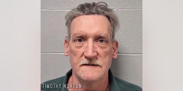 This undated photo provided by Dallas County Sheriff's Office in Buffalo, Missouri shows Timothy Norton. Norton, and James Phelps were charged Wednesday, Nov. 17, 2021, with first-degree murder in the death of 33-year-old Cassidy Rainwater. (Dallas County Sheriff's Office via AP)