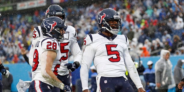 Houston Texans quarterback Tyrod Taylor (5) celebrates after scoring a touchdown against the Tennessee Titans on Nov. 21, 2021, in Nashville, Tennessee.