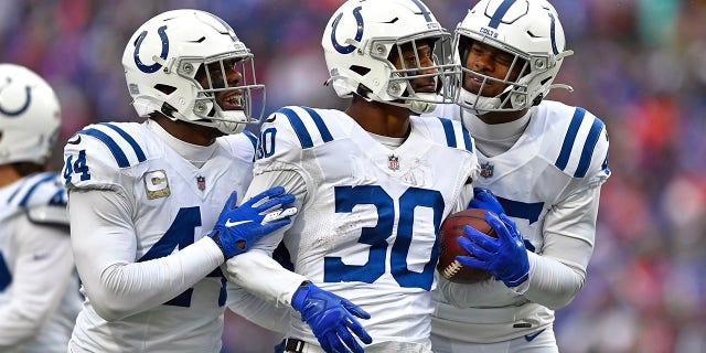 Indianapolis Colts defensive back George Odum (30) celebrates after intercepting a pass during the first half against the Buffalo Bills in Orchard Park, N.Y., Sunday, Nov. 21, 2021.