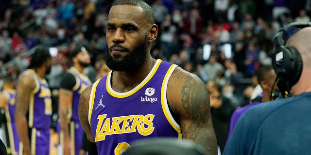 Los Angeles Lakers forward LeBron James is ejected after fouling Detroit Pistons center Isaiah Stewart during the second half of an NBA basketball game, Sunday, Nov. 21, 2021, in Detroit.