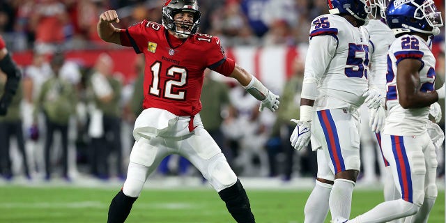 Tampa Bay Buccaneers quarterback Tom Brady (12) reacts to his first down run against the New York Giants during the first half of an NFL football game Monday, Nov. 22, 2021, in Tampa, Florida.