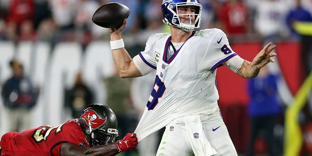 Buccaneers linebacker Devin White grabs New York Giants quarterback Daniel Jones on Monday, Nov. 22, 2021, in Tampa, Florida.