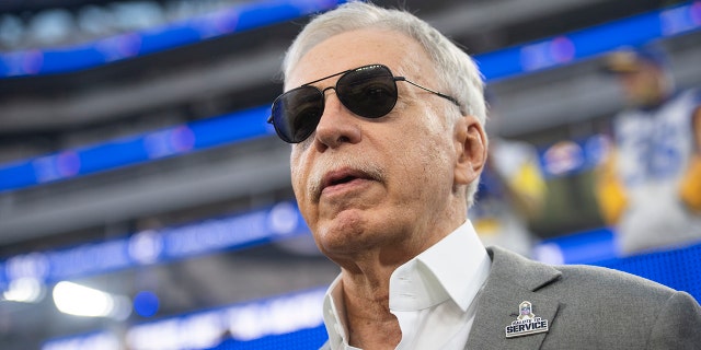 Los Angeles Rams owner Stan Kroenke walks on the field during a game against the Tennessee Titans Nov. 7, 2021, in Inglewood, Calif.