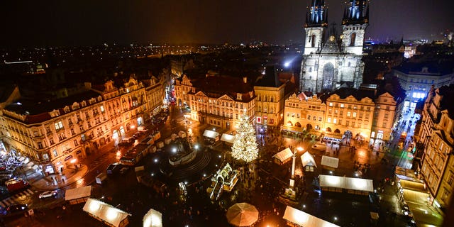A general view of a Christmas market in Old Town Square in Prague, Czech Republic, Friday, Nov. 26, 2021. Due to the high rise in COVID-19 infections, Czech government banned Christmas markets in the whole country as of the evening of Friday Nov. 26, 2021. (Roman Vondrous/CTK via AP)