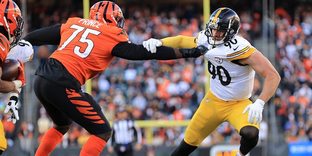 Pittsburgh Steelers outside linebacker T.J. Watt (90) battles Cincinnati Bengals offensive tackle Isaiah Prince (75) as he tries to rush the passer during the second half of an NFL football game, Sunday, Nov. 28, 2021, in Cincinnati.